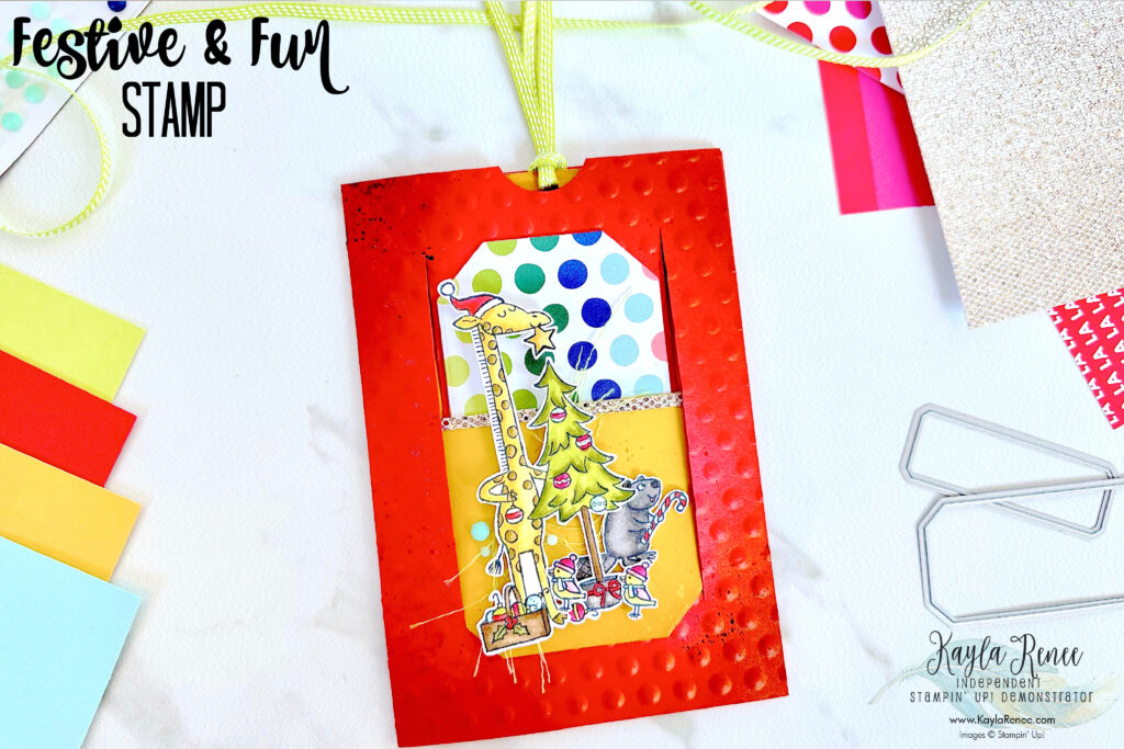 A fun card featuring a pull out slider card design and the Stampin’ Up! Festive & Fun Stamp Set coloured with Stampin' Blends to create a super fun interactive card. This picture shows the front of the card with all the elements and the beautiful Giraffe image from the Festive & Fun Stamp Set all coloured in.