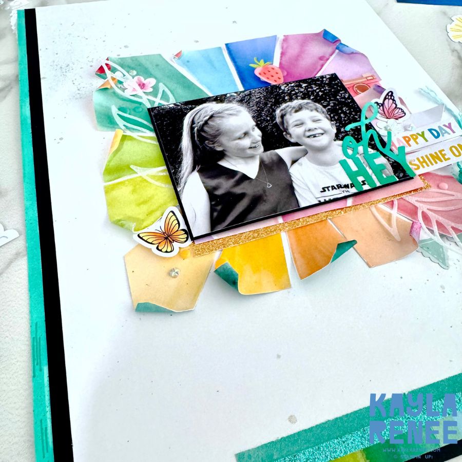 A close up of the finished scrapbook layout with lots of layer and dimension
