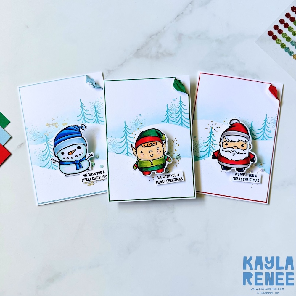Three handmade Christmas cards created with the Stampin’ Up! Festive Friends bundle, featuring a snowman, elf, and Santa character on soft winter backgrounds with stamped trees and snowflakes.