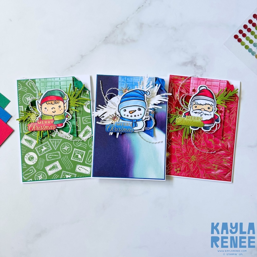 Festive handmade Christmas card set using the Stampin’ Up! Festive Friends bundle, showcasing coordinating elf, snowman and Santa designs with layered textures, embossing and Christmas greenery.