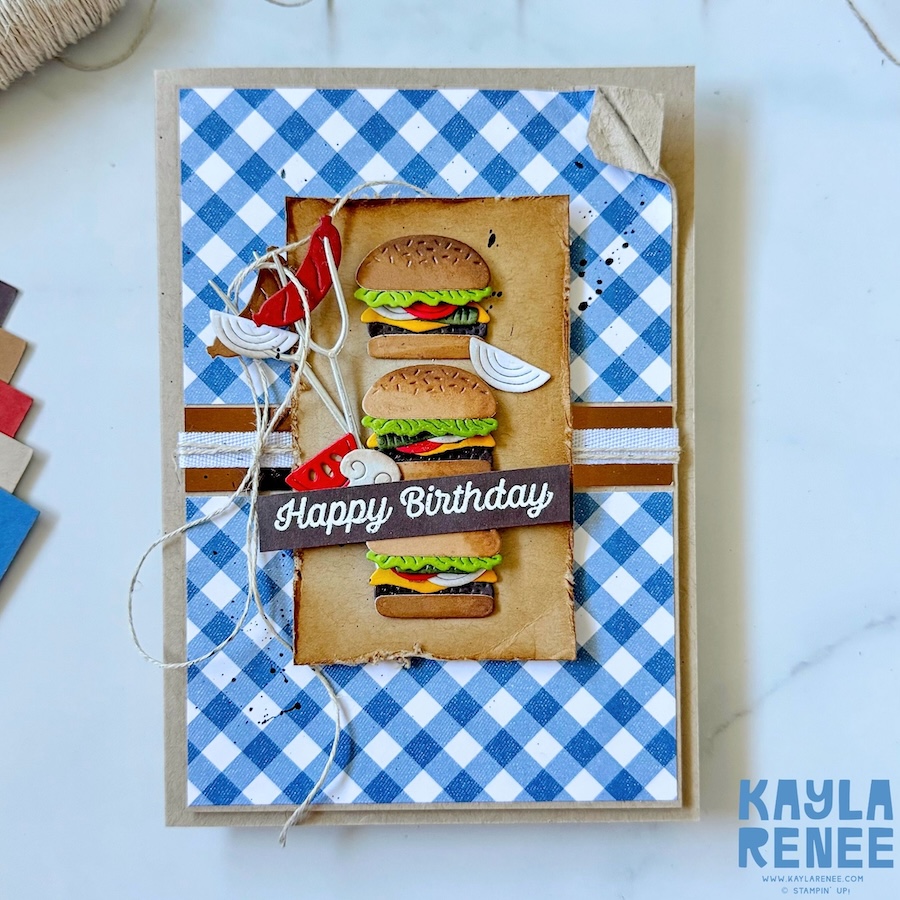 Front view of rustic handmade birthday card with blue gingham background, layered burger elements, twine detail, and bold “Happy Birthday” sentiment created with Stampin’ Up! BBQ Master bundle.