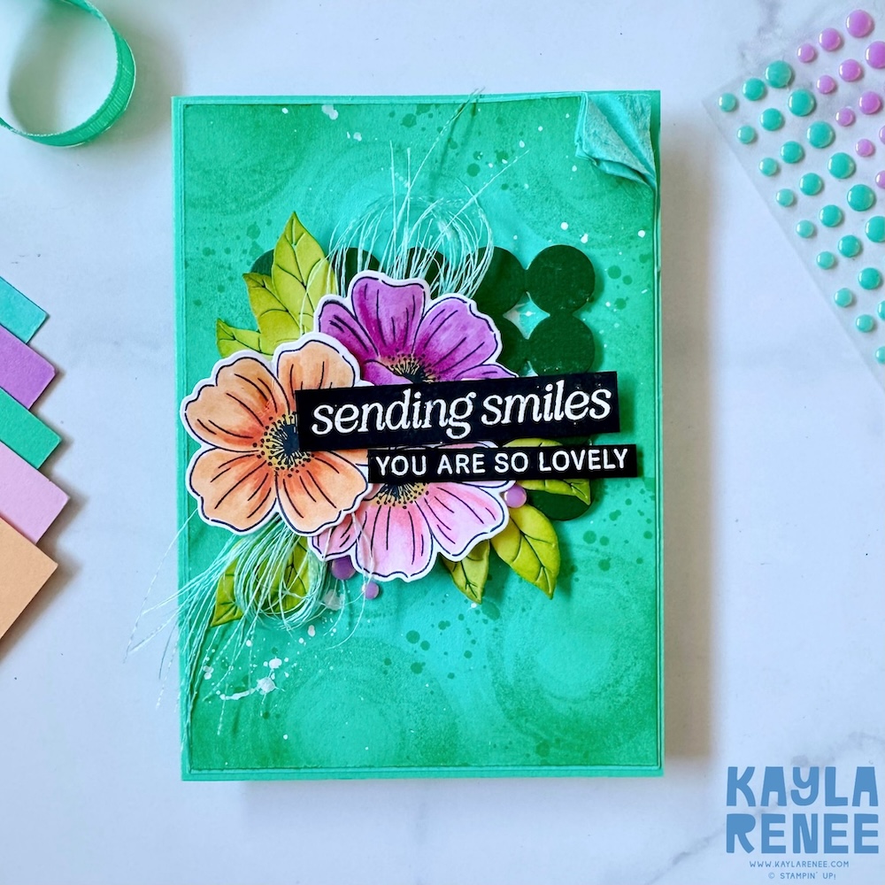 Full view of handmade card with blended green background created using Swirled Designs stamp set, layered die-cut flowers, foliage, and bold sentiment strips in Stampin’ Up! 2024–2026 In Colours.