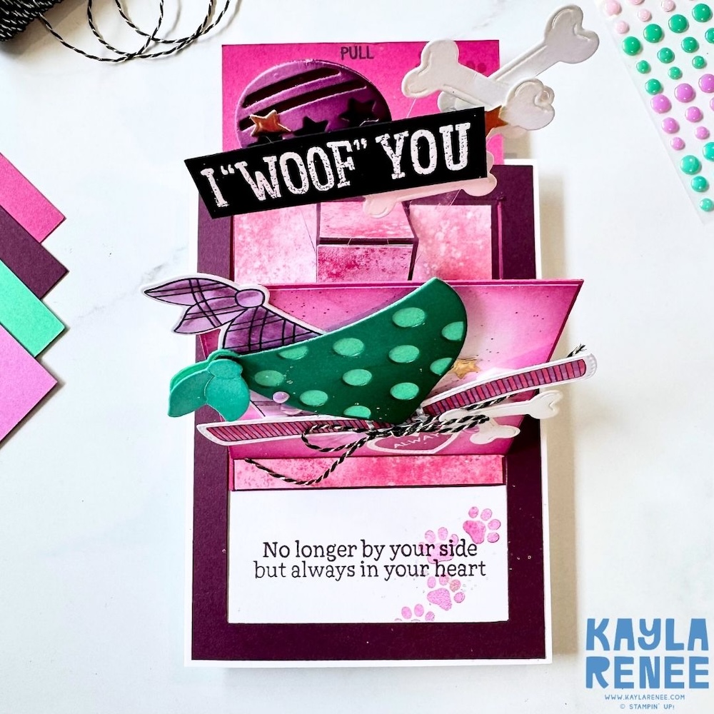 Interactive slider card partially opened, revealing hidden panels and a heartfelt message panel with paw prints beneath the dimensional dog design.