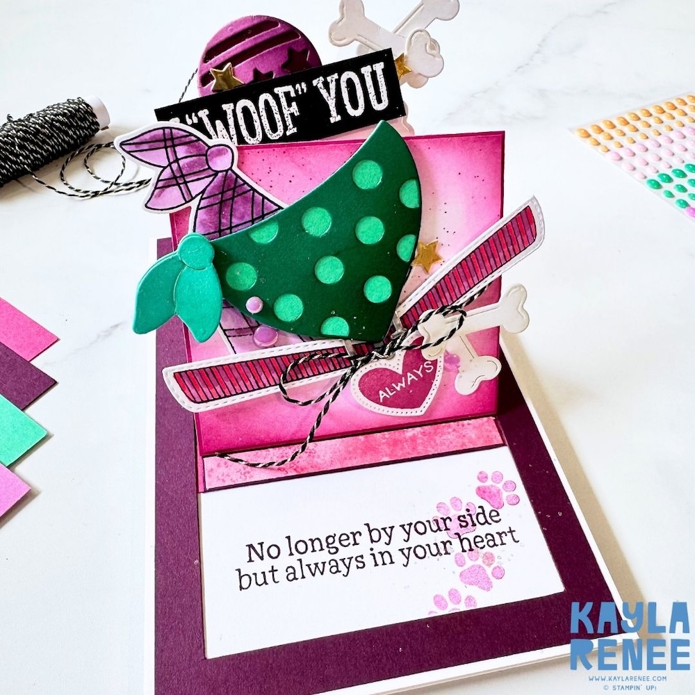 Side view of the card fully opened, highlighting the dimensional pop-up feature, pull mechanism, and the message “No longer by your side but always in your heart.”