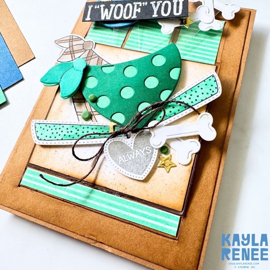 Close-up of the card front highlighting the layered dog, green patterned strips, twine bow, and embellishments from the Pet Love bundle.