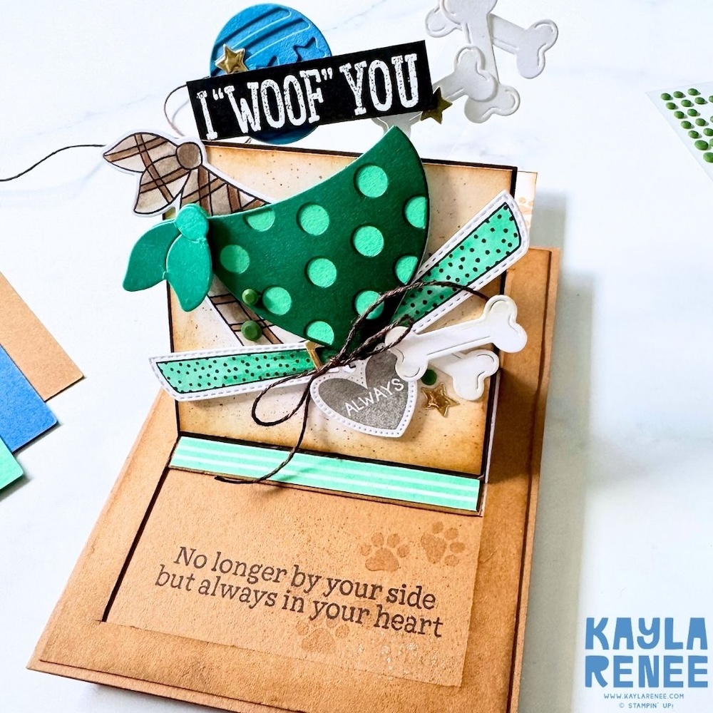 Close-up of the card front highlighting the layered dog, green patterned strips, twine bow, and embellishments from the Pet Love bundle.
