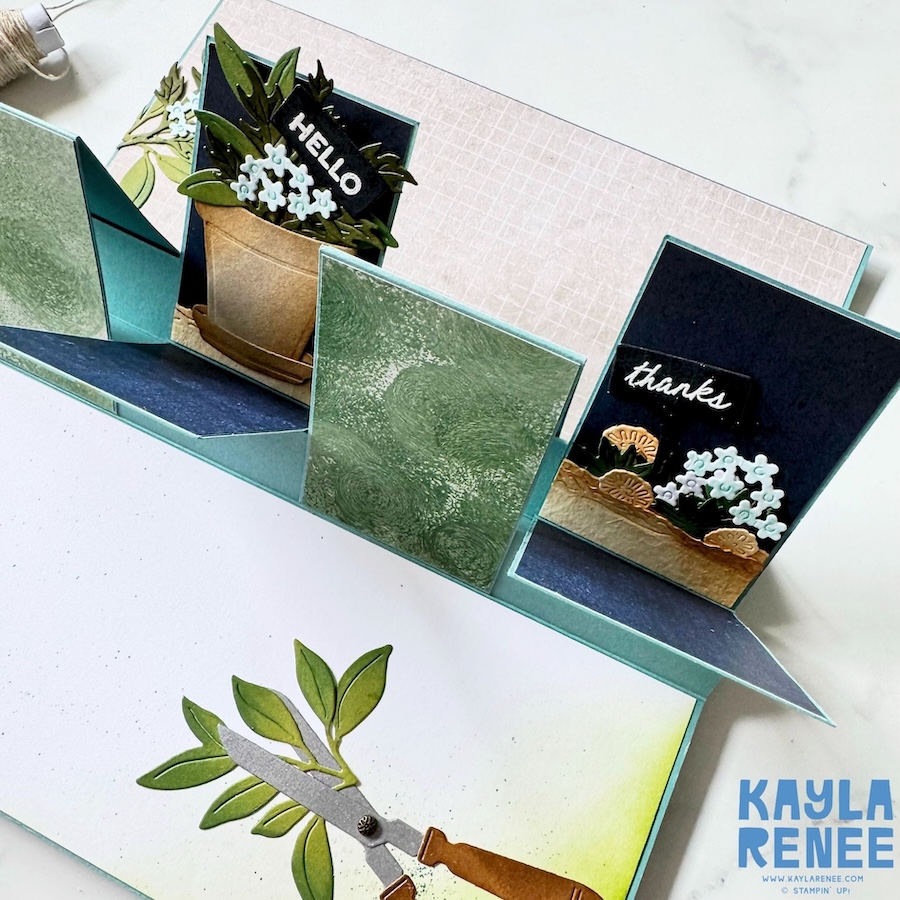 Inside view of an alternating pop-up panel fun fold card created with the Stampin’ Up! Help Me Grow Stamp & Die Bundle, featuring interactive pop-up panels decorated with potted plants, floral arrangements, “Hello” and “thanks” sentiments, and layered garden-inspired details.