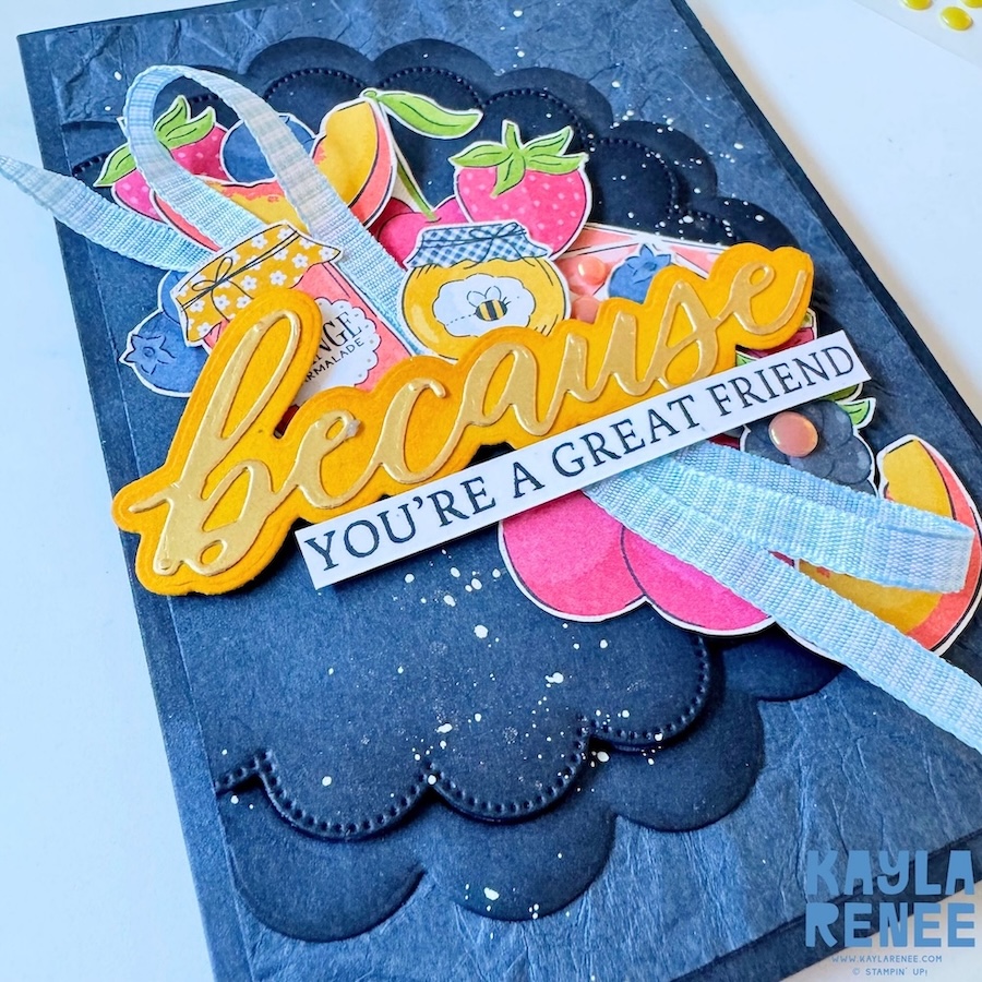 Angled close-up of a Stampin’ Up! Homemade Sweetness Designer Series Paper card featuring dimensional fruit layers, stitched scallop die cuts, paint splatter details, and layered sentiments from the Words of Beauty bundle.