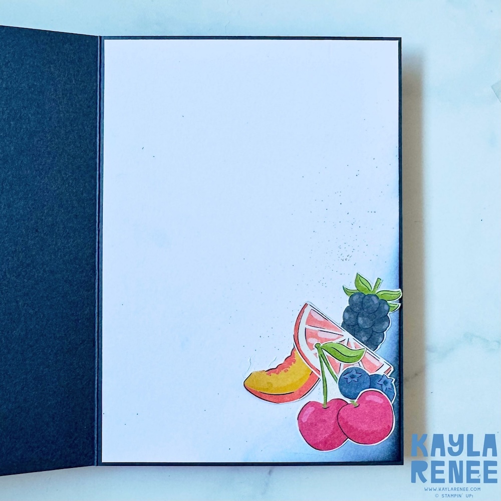 Inside view of a handmade Stampin’ Up! Homemade Sweetness card featuring a clean white writing panel decorated with cherries, berries, citrus slices, and soft ink blending in the corner.