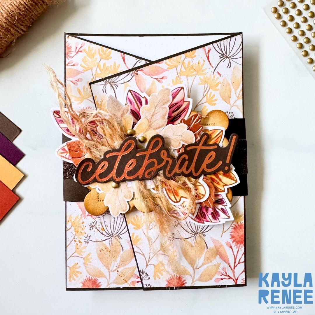 Handmade angled gatefold card featuring Glow of Harvest Specialty Designer Series Paper with soft autumnal florals and foliage. The centre features layered leaves, flowers, natural fibres and a large copper-foiled “Celebrate!” sentiment.