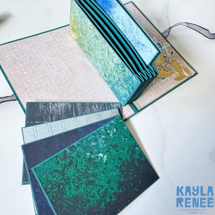 Detailed view of the pop-up expanding pocket card showing the accordion folds and expanding pocket filled with layered card panels, decorated with coordinating Stampin’ Up! Nature Walk patterned paper.