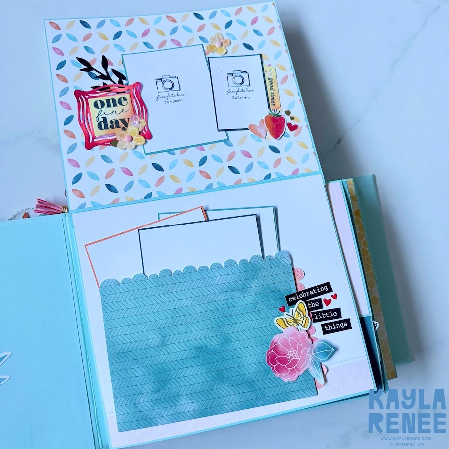 Open mini album pages decorated with pastel patterned paper, butterflies and layered scrapbook embellishments, including photo spaces and journaling areas for recording memories.