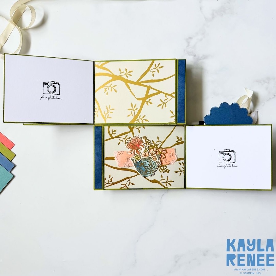 Double flip book card opened further to reveal additional interactive panels decorated with gold branch motifs and coordinating patterned paper, with blank areas for photos or messages.